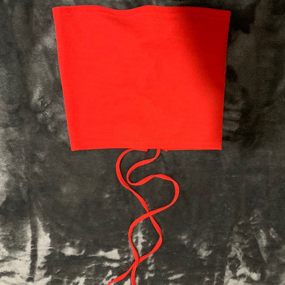 Strapless, red  tube top with a strap in the back